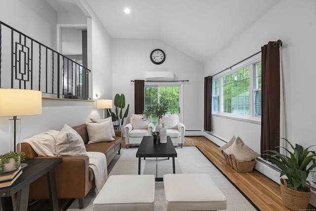 living area featuring wood finished floors, a wall mounted air conditioner, vaulted ceiling, baseboard heating, and stairway