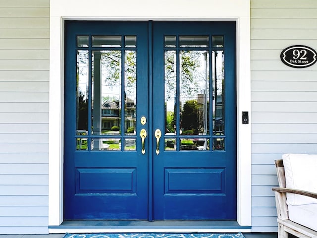 property entrance featuring french doors