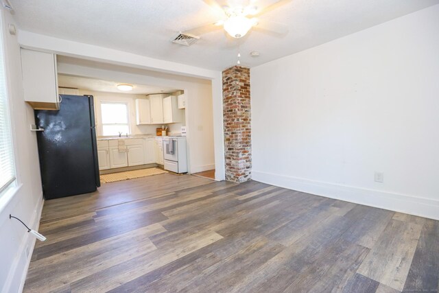 108 New Litchfield St, Torrington, CT 06790 - unfurnished living room with a ceiling fan and wood finished floors