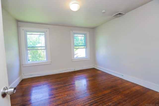 108 New Litchfield St, Torrington, CT 06790 - empty room featuring healthy amount of natural light and wood finished floors