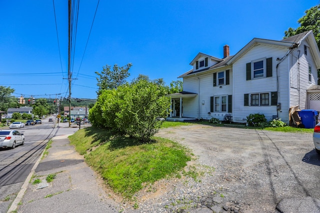 108 New Litchfield St, Torrington, CT 06790 - view of front of house featuring a chimney