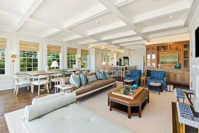 25 Tokeneke Trl, Darien, CT 06820 - living area featuring coffered ceiling, healthy amount of natural light, beam ceiling, wood finished floors, and crown molding