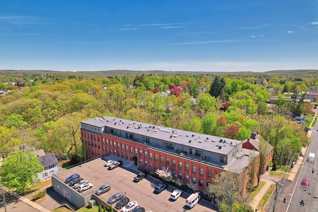 aerial view featuring a view of trees