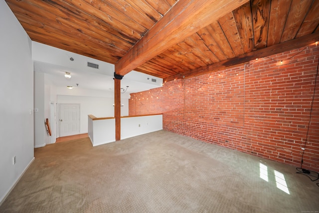 spare room featuring brick wall, visible vents, wood ceiling, and carpet