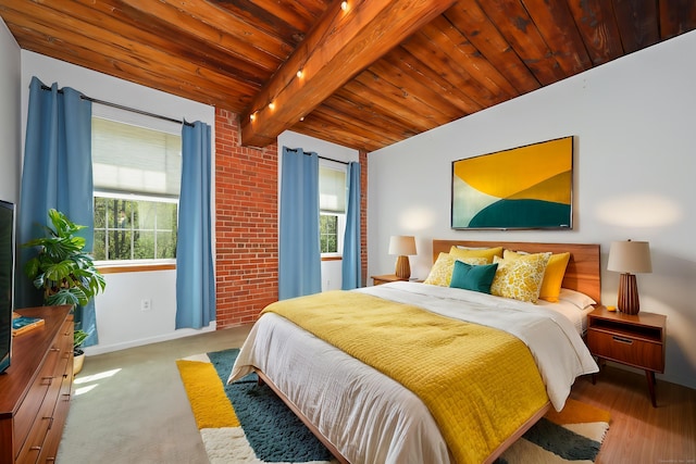 bedroom featuring baseboards, wood ceiling, carpet flooring, and beam ceiling