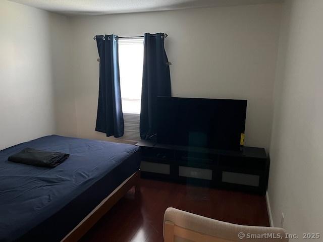 57 Meetinghouse Vlg Unit 6, Meriden, CT 06450 - bedroom with wood finished floors