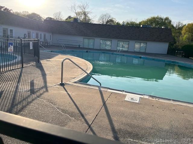 57 Meetinghouse Vlg Unit 6, Meriden, CT 06450 - community pool featuring fence and a patio area