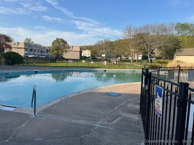 57 Meetinghouse Vlg Unit 6, Meriden, CT 06450 - pool featuring fence
