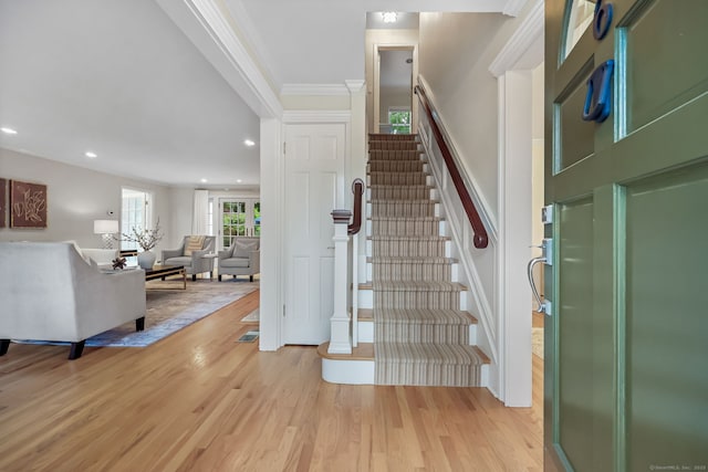 6 Weathervane Hl, Westport, CT 06880 - entrance foyer featuring light wood-style floors, crown molding, stairway, and recessed lighting