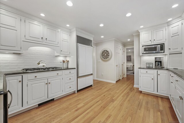 6 Weathervane Hl, Westport, CT 06880 - kitchen with built in appliances, baseboards, dark countertops, ornamental molding, and recessed lighting
