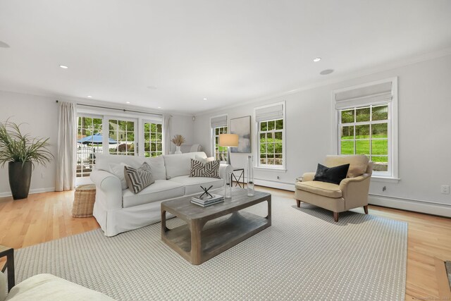 6 Weathervane Hl, Westport, CT 06880 - living room with plenty of natural light, light wood finished floors, a baseboard heating unit, recessed lighting, and crown molding
