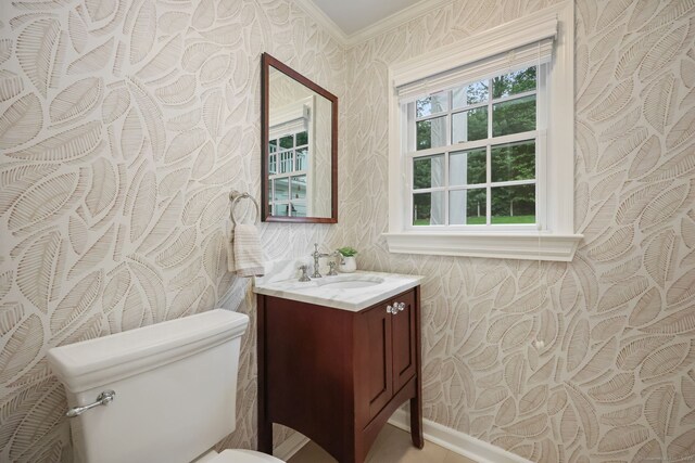 6 Weathervane Hl, Westport, CT 06880 - bathroom featuring wallpapered walls, vanity, toilet, ornamental molding, and baseboards