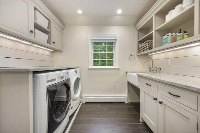 6 Weathervane Hl, Westport, CT 06880 - laundry area with a baseboard radiator, washer and clothes dryer, wood finish floors, recessed lighting, and cabinet space