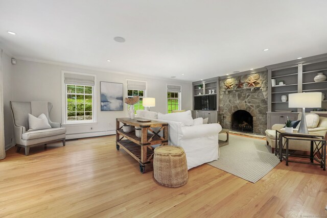 6 Weathervane Hl, Westport, CT 06880 - living room featuring a baseboard heating unit, healthy amount of natural light, light wood-style flooring, ornamental molding, and recessed lighting