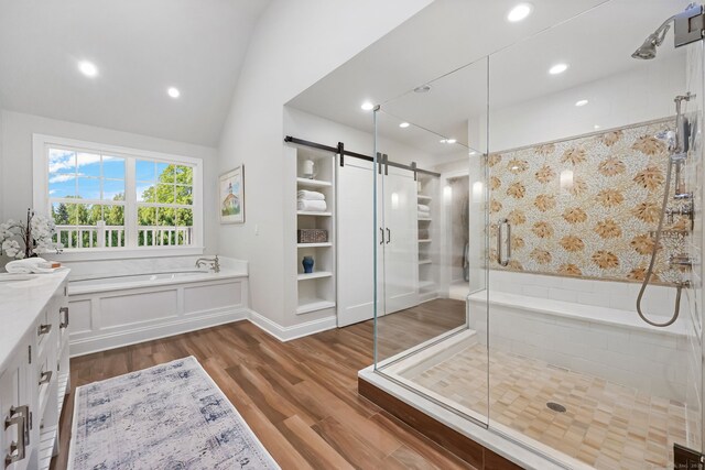 6 Weathervane Hl, Westport, CT 06880 - bathroom with a garden tub, a stall shower, vanity, wood finished floors, and recessed lighting