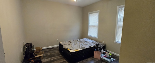 324 Mountain Grove St, Bridgeport, CT 06605 - misc room with baseboards and dark wood-style floors