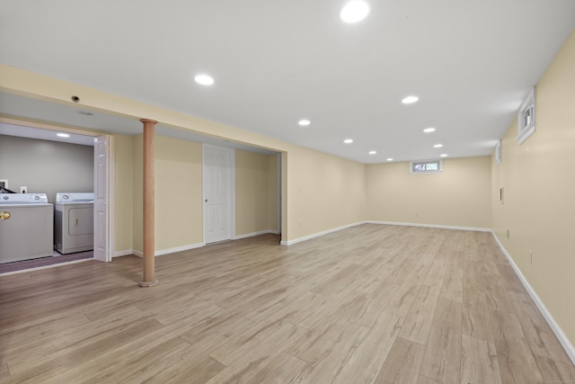 201 Orchard Ave, Newington, CT 06111 - below grade area with washer and clothes dryer, light wood-style floors, and recessed lighting