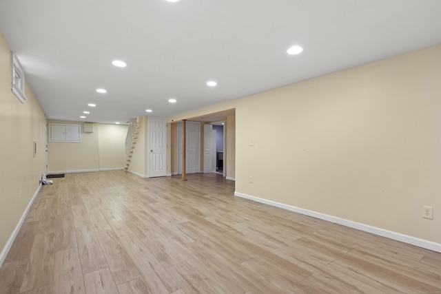 201 Orchard Ave, Newington, CT 06111 - spare room with stairs, light wood-type flooring, and recessed lighting