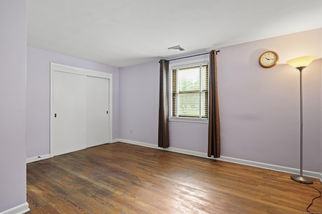 201 Orchard Ave, Newington, CT 06111 - unfurnished bedroom with wood finished floors and a closet