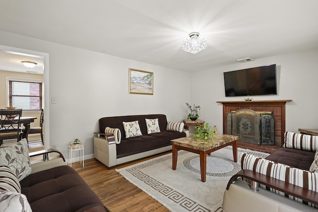 201 Orchard Ave, Newington, CT 06111 - living area featuring wood finished floors and a fireplace
