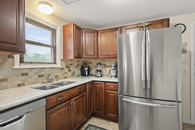 201 Orchard Ave, Newington, CT 06111 - kitchen with stainless steel appliances, tasteful backsplash, and light tile patterned flooring