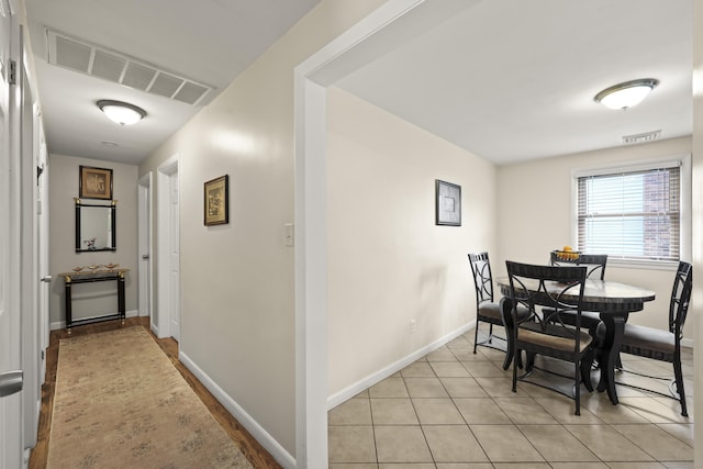 201 Orchard Ave, Newington, CT 06111 - dining area featuring baseboards and light tile patterned flooring