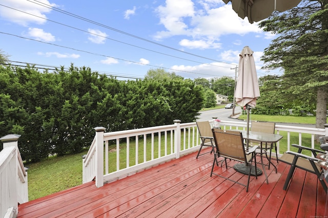 201 Orchard Ave, Newington, CT 06111 - wooden deck with outdoor dining area and a lawn