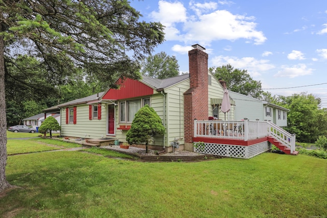 201 Orchard Ave, Newington, CT 06111 - view of property exterior with a chimney, a yard, and a deck