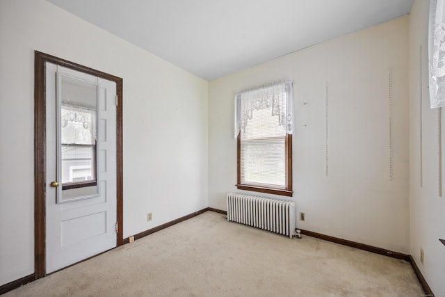 19 Terhune Ave, Branford, CT 06405 - empty room with baseboards, radiator, and light colored carpet