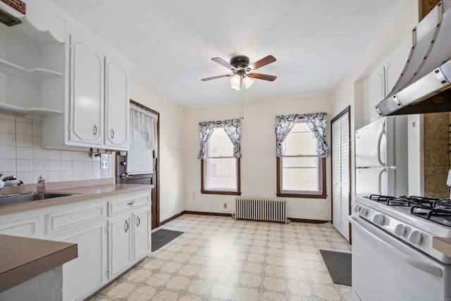 19 Terhune Ave, Branford, CT 06405 - kitchen with a ceiling fan, light floors, under cabinet range hood, white appliances, and radiator heating unit