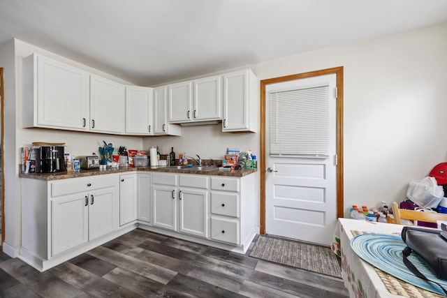 19 Terhune Ave, Branford, CT 06405 - kitchen with a sink, white cabinetry, dark wood-style floors, and dark stone countertops
