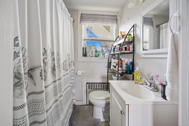 19 Terhune Ave, Branford, CT 06405 - full bathroom featuring a shower with curtain, toilet, baseboards, radiator heating unit, and vanity