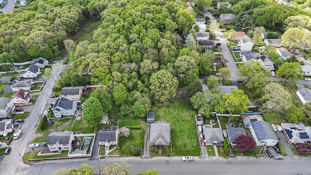 298 Wall St, Waterbury, CT 06704 - aerial overview of property's location with nearby suburban area and a heavily wooded area