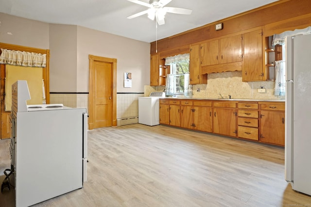 298 Wall St, Waterbury, CT 06704 - kitchen with washer / dryer, range, ceiling fan, freestanding refrigerator, and light wood-style floors