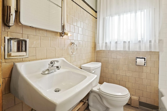 298 Wall St, Waterbury, CT 06704 - bathroom with tile walls, toilet, and a sink