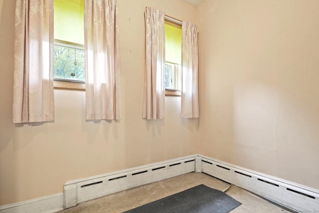 298 Wall St, Waterbury, CT 06704 - unfurnished room featuring a baseboard radiator and tile patterned floors