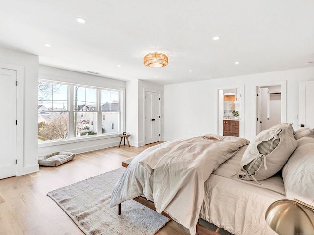 13 Dunbar Rd, Milford, CT 06460 - bedroom featuring recessed lighting, light wood-type flooring, and ensuite bath