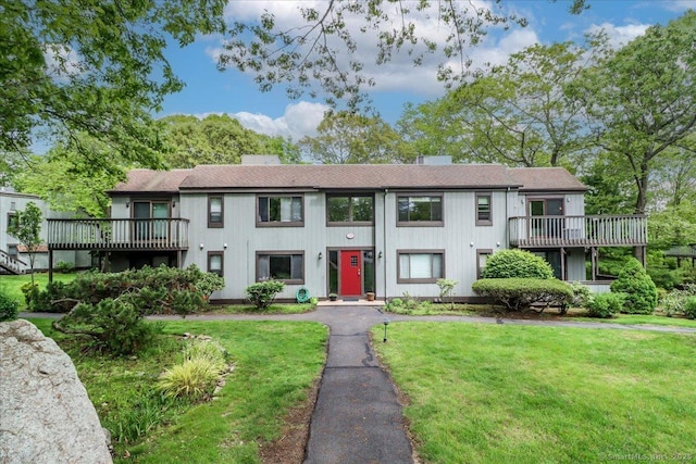 28D Harbour Vlg, Branford, CT 06405 - townhome / multi-family property featuring a front yard, a balcony, a shingled roof, and board and batten siding