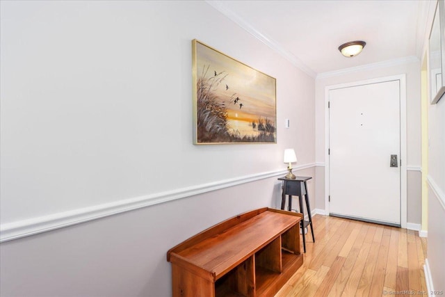 28D Harbour Vlg, Branford, CT 06405 - entrance foyer with light wood-style flooring, crown molding, and baseboards