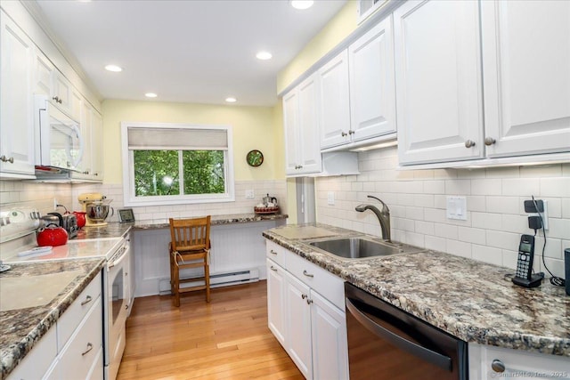 28D Harbour Vlg, Branford, CT 06405 - kitchen featuring white appliances, a sink, decorative backsplash, white cabinets, and recessed lighting