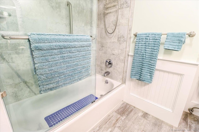 28D Harbour Vlg, Branford, CT 06405 - full bath with shower / bath combination with glass door and wood finished floors