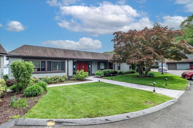 28D Harbour Vlg, Branford, CT 06405 - view of front of house with a front lawn and stucco siding