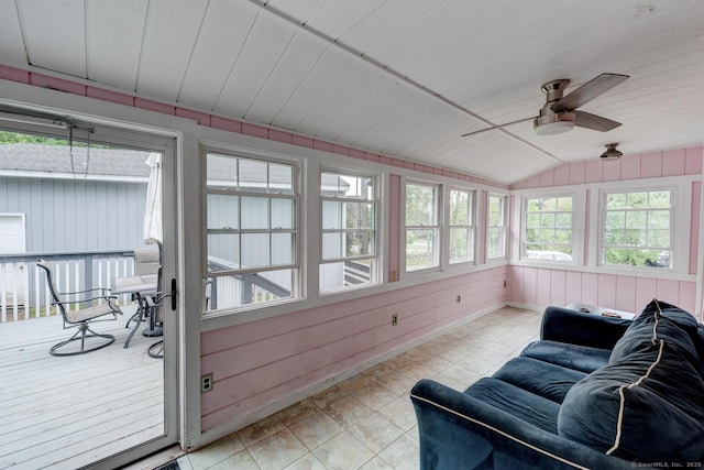 140 College Ave, Torrington, CT 06790 - sunroom featuring lofted ceiling, a ceiling fan, a wooden deck, and wooden walls