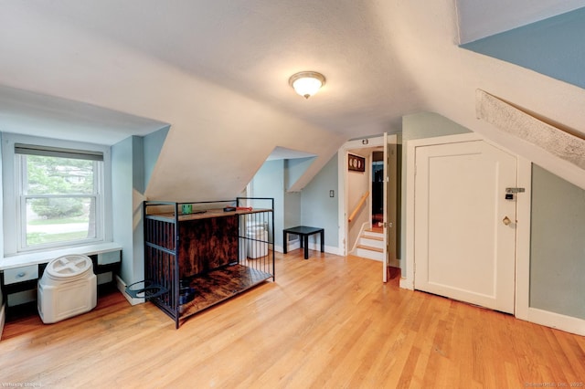 140 College Ave, Torrington, CT 06790 - bonus room featuring light wood-style floors, lofted ceiling, and baseboards