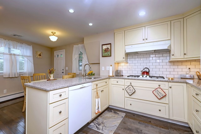 24 Wall St, Shelton, CT 06484 - kitchen with white appliances, a sink, under cabinet range hood, a peninsula, and plenty of natural light