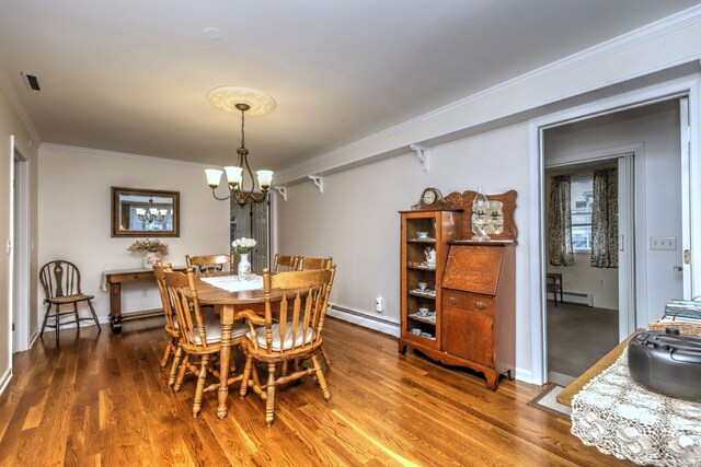 24 Wall St, Shelton, CT 06484 - dining space featuring crown molding, a chandelier, baseboard heating, and wood finished floors