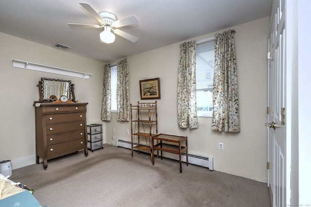 24 Wall St, Shelton, CT 06484 - living area with carpet, ceiling fan, and baseboard heating