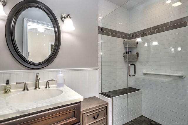 24 Wall St, Shelton, CT 06484 - bathroom featuring a shower stall, wainscoting, and vanity