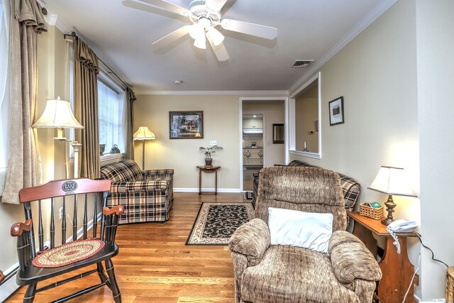 24 Wall St, Shelton, CT 06484 - living area with a ceiling fan, crown molding, wood finished floors, and baseboards