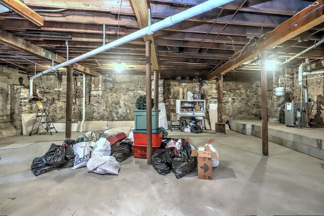 24 Wall St, Shelton, CT 06484 - unfinished below grade area with a heating unit